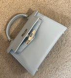 Sac à main bleu bébé