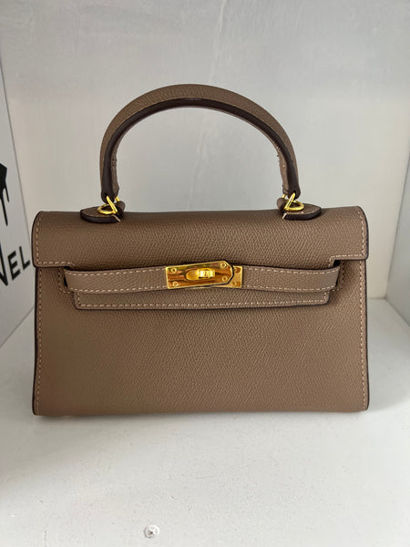 Sac taupe détails or