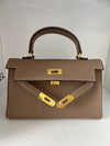 Sac taupe détails or