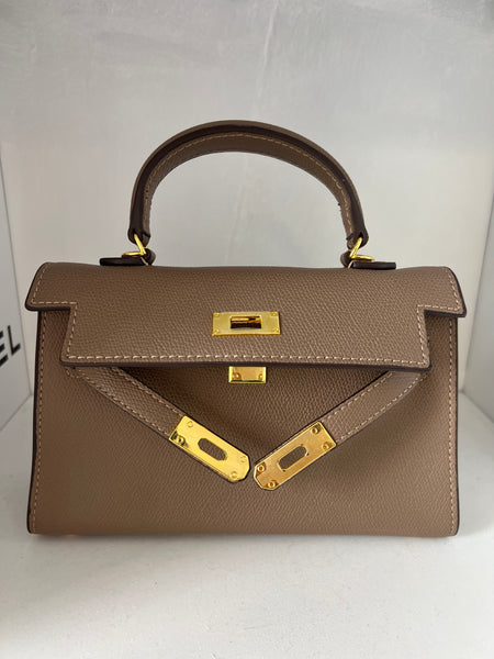 Sac taupe détails or